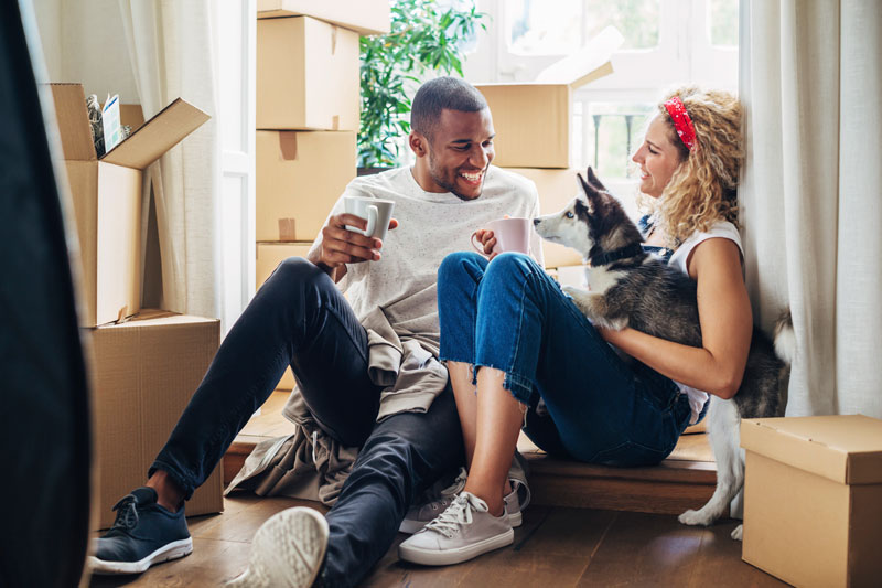 Happy couple and their dog