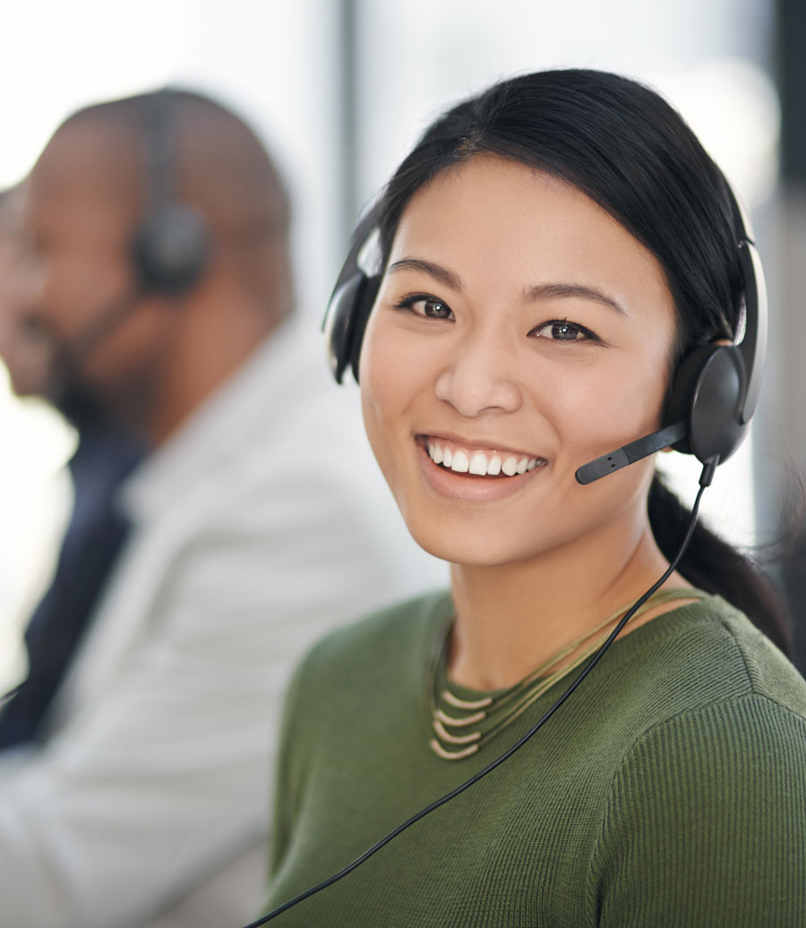 Female loan officer talking to a borrower with a smile