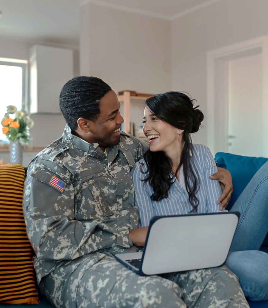 Military Guy And His Girlfriend Playing With An Ipad