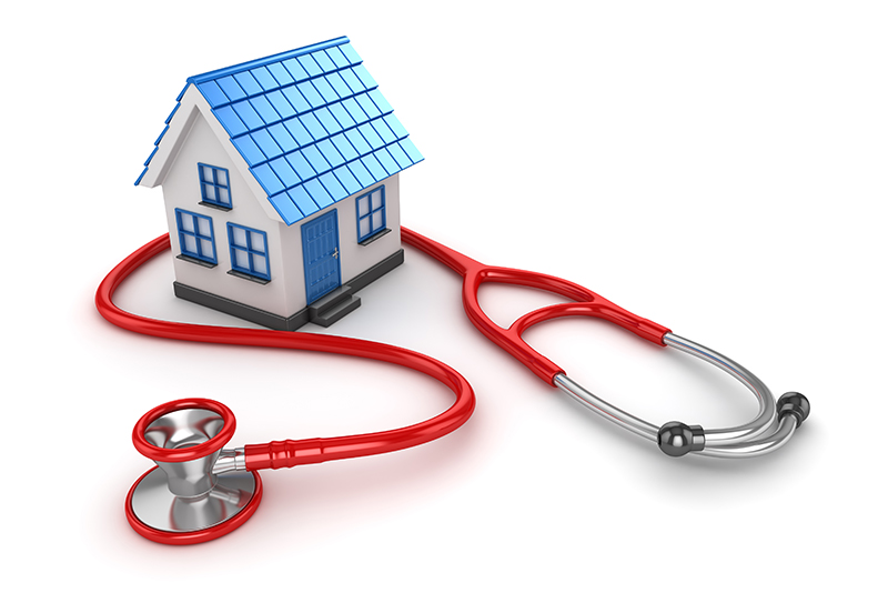 Toy house with red stethoscope