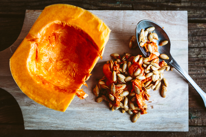 Pumpkin cut in half with seeds