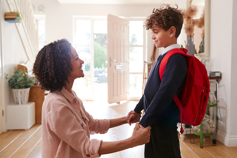 Mother and son getting ready to leave for first day of school