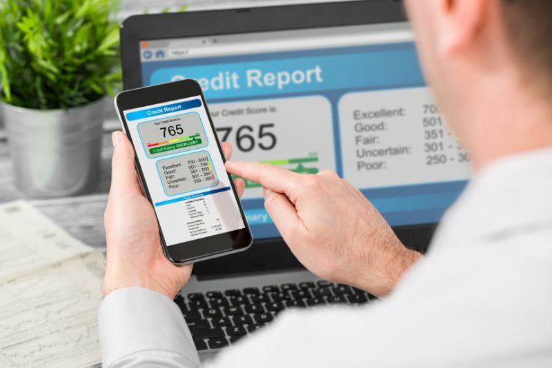 man checking his credit score